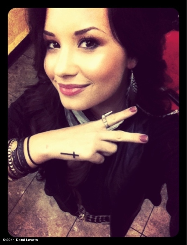 demi lovato tattoo for fans. Demi Lovato#39;s cross tattoo on