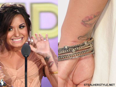 Demi Lovato's tattoo of lips on her wrist
