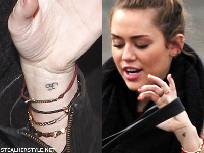 Miley Cyrus Om tattoo
