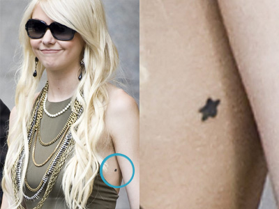 Taylor Momsen's tattoo a black star on her left side