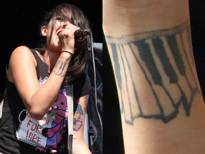 Tattoos Ugly on Piano Keys From Cursive S The Ugly Organ Around Her Right Wrist