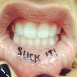 Kesha lip tattoo suck it