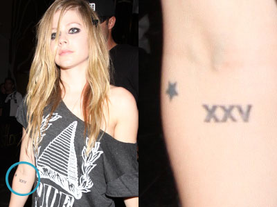Avril Lavigne star and XXV tattoos