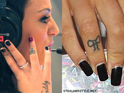 Cher Lloyd bow finger tattoo