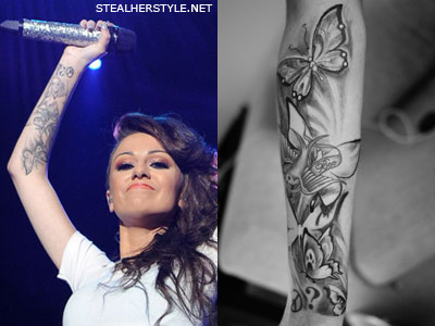 butterfly tattoo side designs
 on Cher incorporated the bird, peace sign, and question mark tattoos into ...