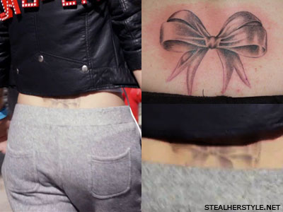 Cher Lloyd bow lower back tattoo