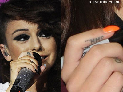 On the inside of Cher's right index finger is SHH This tattoo idea was 