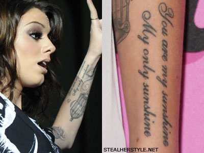 On the side of Cher's arm she tattooed'You are my sunshine My only 