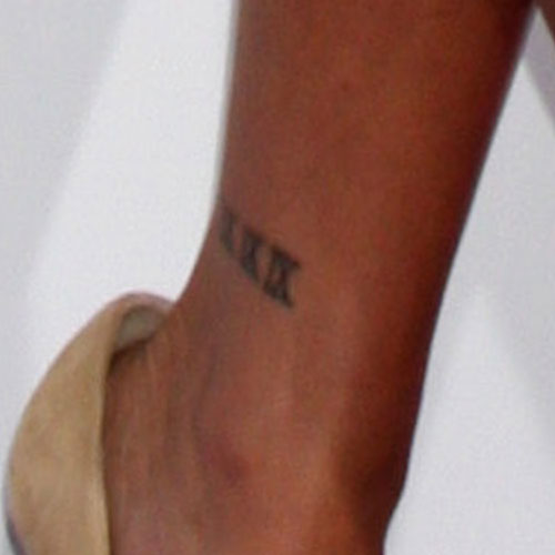 Lauren London Roman Numeral Ankle Tattoo | Steal Her Style