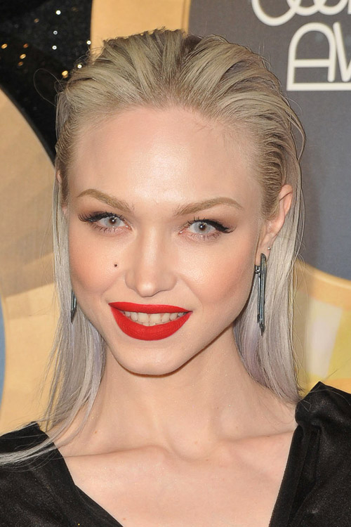 Ivy Levan Straight Ash Blonde Slicked Back Hairstyle