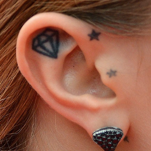 cara-delevingne-ear-tattoo