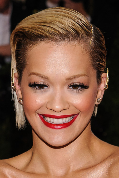 Rita Ora Straight Honey Blonde Dark Roots Slicked Back Hairstyle