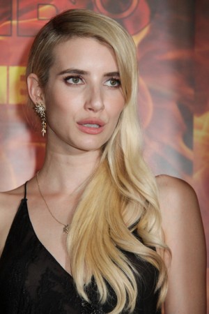 Emma Roberts Wavy Golden Blonde Faux Sidecut Side Part Hairstyle