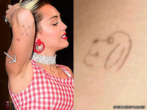Miley Cyrus Dog Upper Arm Tattoo | Steal Her Style