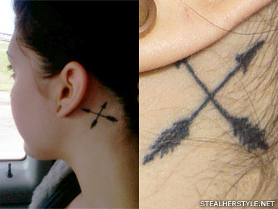 Sierra Kusterbeck arrow behind ear tattoo