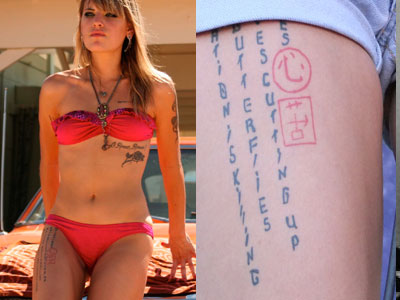 Juliet Simms thigh tattoo
