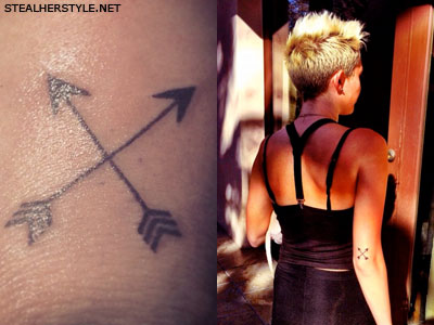 Miley Cyrus crossed arrow tattoo