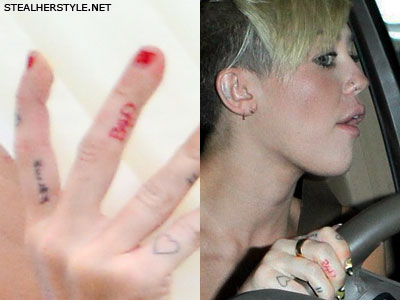 Miley Cyrus bad finger tattoo