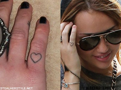 Miley Cyrus finger heart tattoo