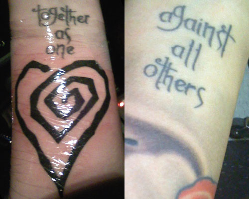 Lexus Amanda tattoo heart 'Together as one, against all others'