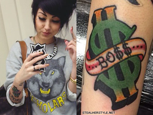 Melissa Marie Green dollar sign arm tattoo