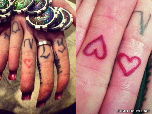 Melissa Marie Green heart finger tattoo