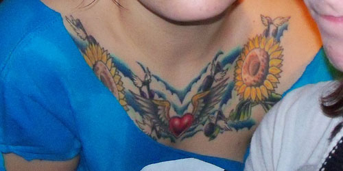 Krysta Cameron's chest piece tattoo