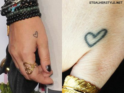 Brandi Cyrus heart hand tattoo