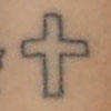 Lily Allen Christian cross wrist tattoo