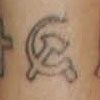 Lily Allen communist hammer and sickle wrist tattoo