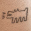 Lily Allen Keith Haring dog wrist tattoo