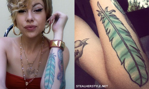 Lil Debbie feather tattoo