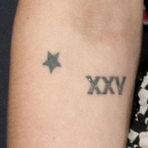 avril-lavigne-star-xxv-elbow-tattoo