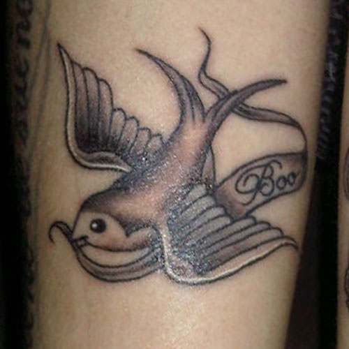 cher-lloyd-boo-bird-arm-tattoo