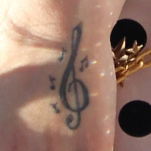 Cher Lloyd's Treble Clef Hand Tattoo | Steal Her Style