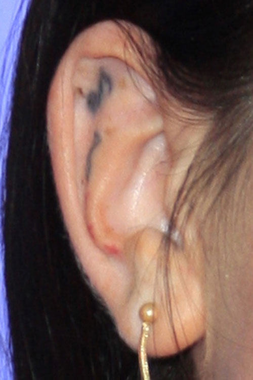 jojo-music-note-ear-tattoo
