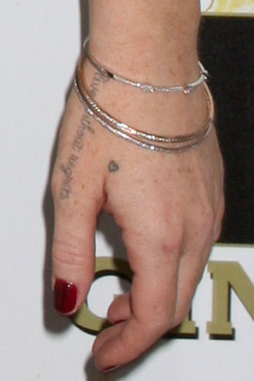 Lindsay Lohan's 11 Tattoos & Meanings | Steal Her Style
