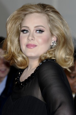 Adele Wavy Ash Blonde Bouffant Hairstyle | Steal Her Style