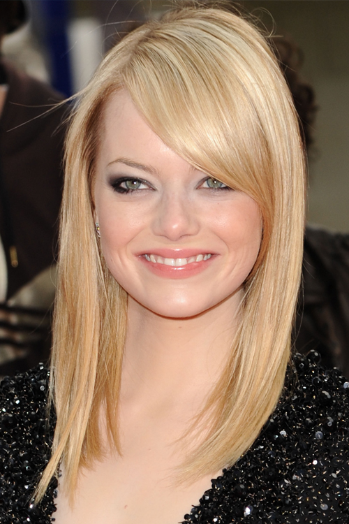 Emma Stone Straight Golden Blonde Sideswept Bangs Hairstyle | Steal Her ...