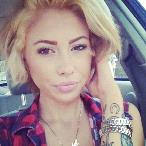 Lil Debbie's Horseshoe Wrist Tattoos | Steal Her Style