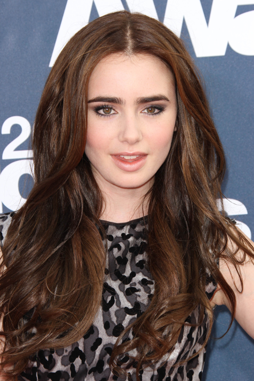 Lily Collins Wavy Medium Brown Hairstyle | Steal Her Style