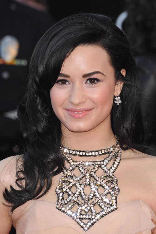 Demi Lovato Wavy Black Side Part Hairstyle | Steal Her Style