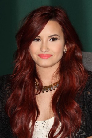 Demi Lovato Wavy Red Loose Waves, Sideswept Bangs Hairstyle | Steal Her ...