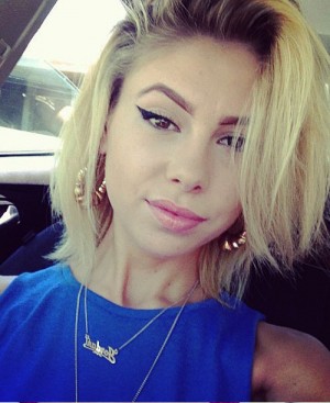 Lil Debbie Straight Golden Blonde Dark Roots Hairstyle | Steal Her Style