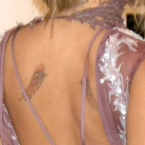 Nicole Richie reveals unusual circle marks and faded angel wing tattoos on  back in Sydney  Daily Mail Online