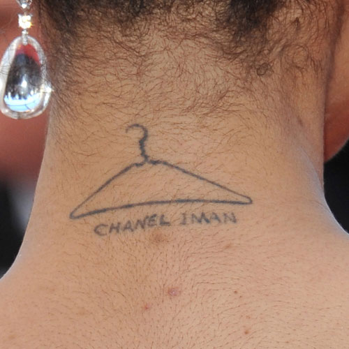 Model Chanel Iman has a tattoo on the back of her neck of a clothes hanger ...