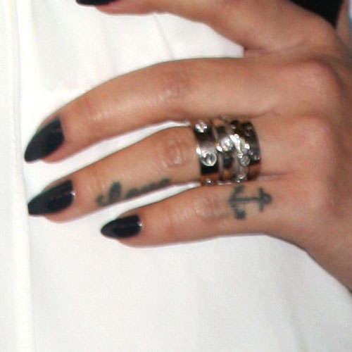 Love Louis Vuitton finger tats  Knuckle tattoos, Finger tattoo designs,  Cool finger tattoos