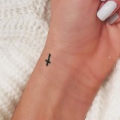 Eleanor Calder Cross Wrist Tattoo | Steal Her Style