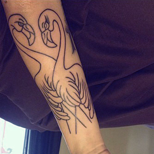 melissa-marie-green-flamingo-arm-tattoo