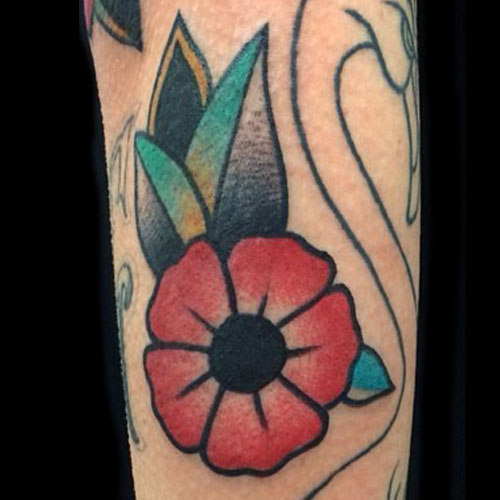 melissa-marie-green-flower-arm-tattoo